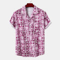Men's vintage print short sleeve shirt from R&G Boutique featuring retro-inspired design and classic fit.