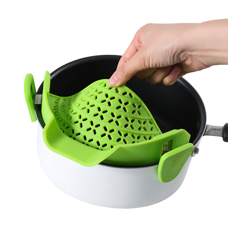 R&G Boutique silicone pot side drain stopper gadget for kitchen, flexible, durable, and designed to fit various pot sizes.