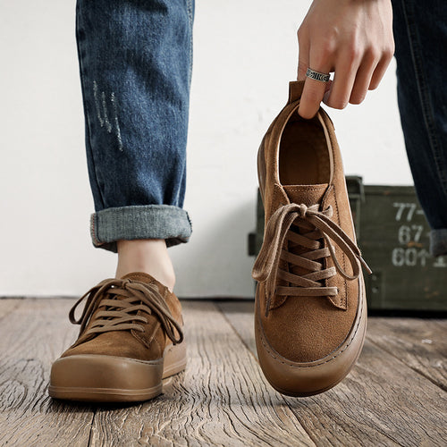 Casual men's leather shoes by R&G Boutique featuring a retro style with brown leather and classic lace-up design.