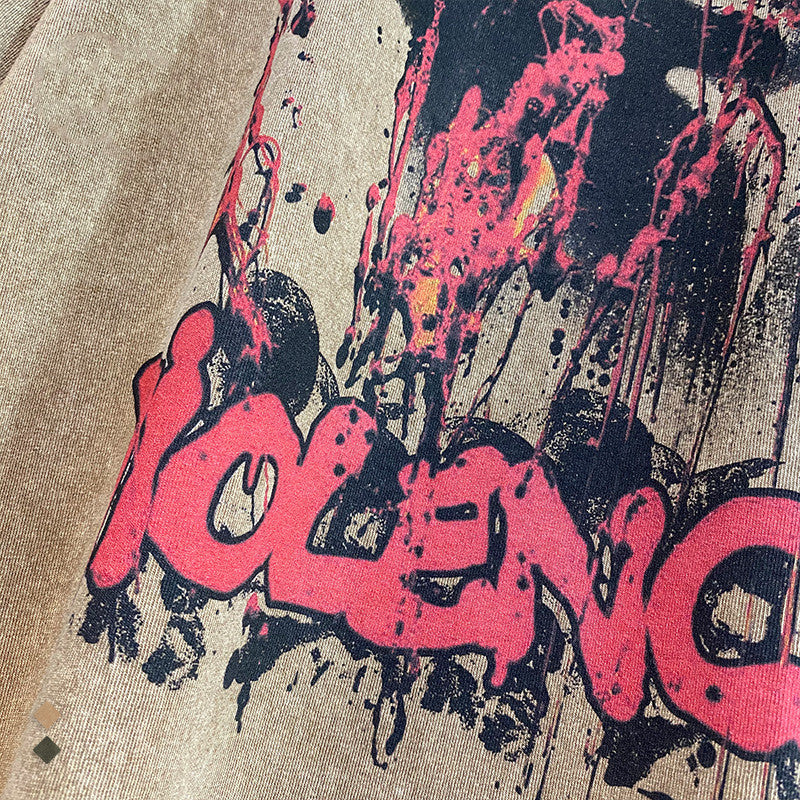R&G Boutique TeeBatik distressed print short sleeve T-shirt with faded, vintage-style design and casual fit.