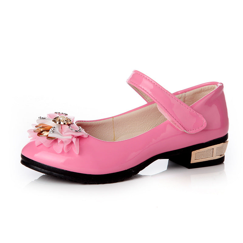 Cute girls' leather shoes with bowknot detail by R&G Boutique, featuring a stylish design and comfortable fit.