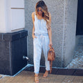 R&G Boutique denim sleeveless jumpsuit with wide legs and adjustable straps, displayed on a hanger.