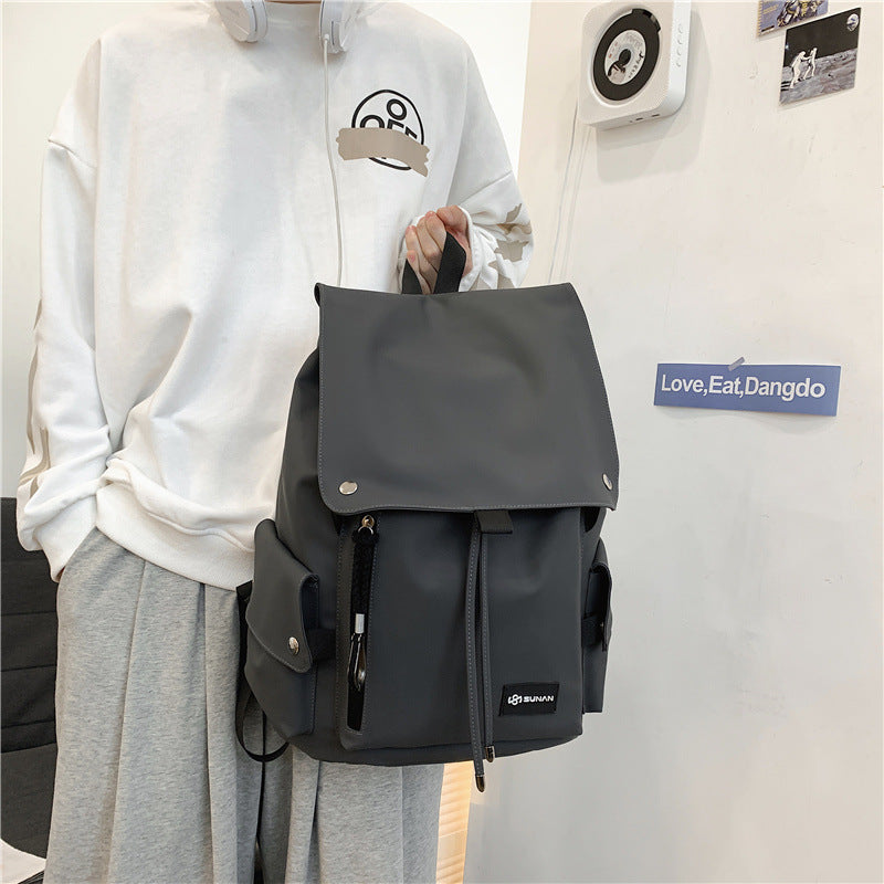 Large R&G Boutique Ins Backpack with locomotive design, spacious school bag for students, suitable for carrying books and supplies.
