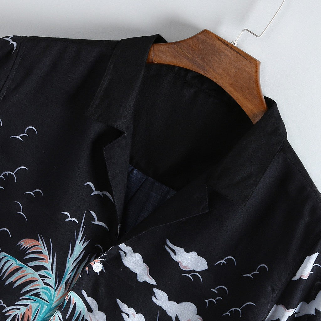 Men's loose-fit printed short sleeve shirt from R&G Boutique, featuring a stylish casual design and vibrant pattern.