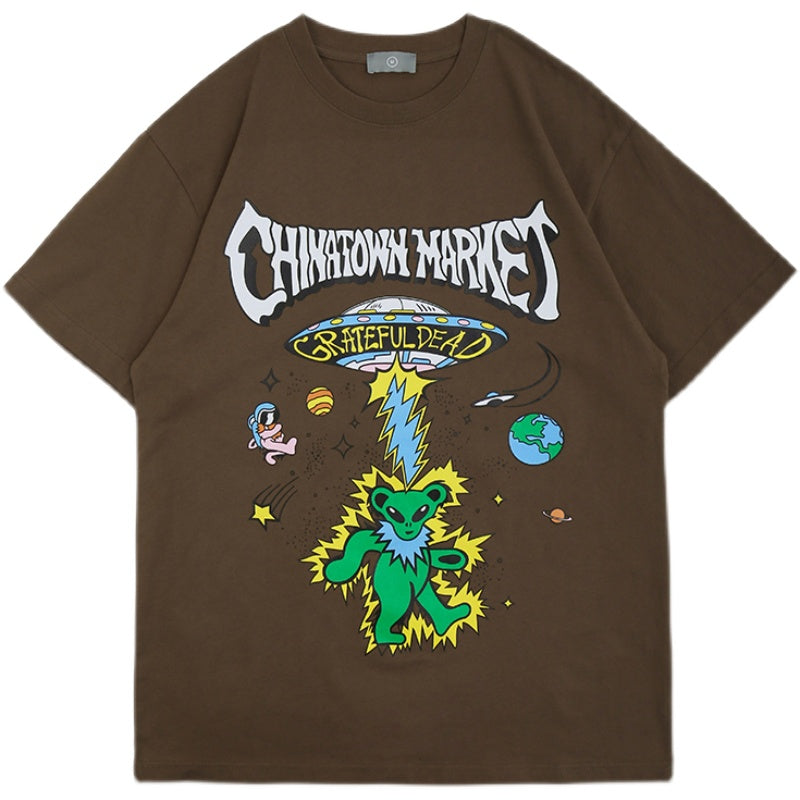 R&G Boutique Star Man cartoon print short sleeve T-shirt featuring a colorful star-themed design on white fabric.