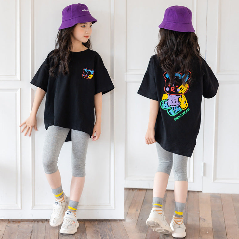 Colorful cartoon irregular top with short sleeves for kids, trendy design from R&G Boutique, casual and comfortable for big kids.
