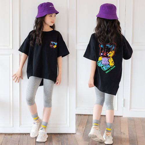 Colorful cartoon irregular top with short sleeves for kids, trendy design from R&G Boutique, casual and comfortable for big kids.