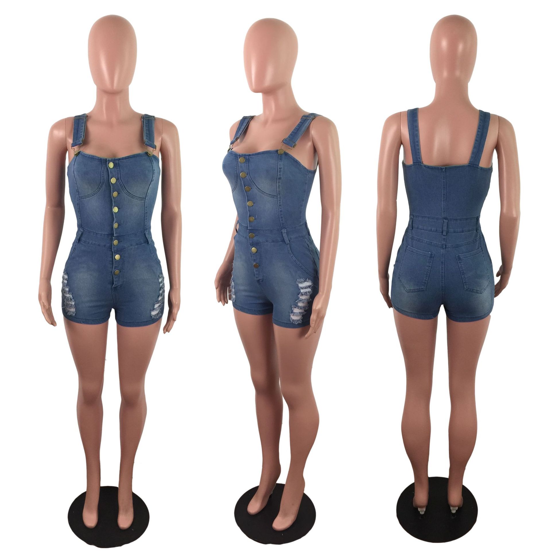 Slim-fit denim jumpsuit by All Season Gifts featuring a classic design and front pockets, displayed on a mannequin.