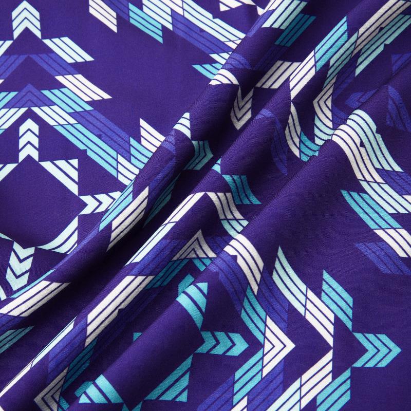 Men's short sleeve ethnic print beach shirt by R&G Boutique featuring vibrant colorful patterns and lightweight fabric.