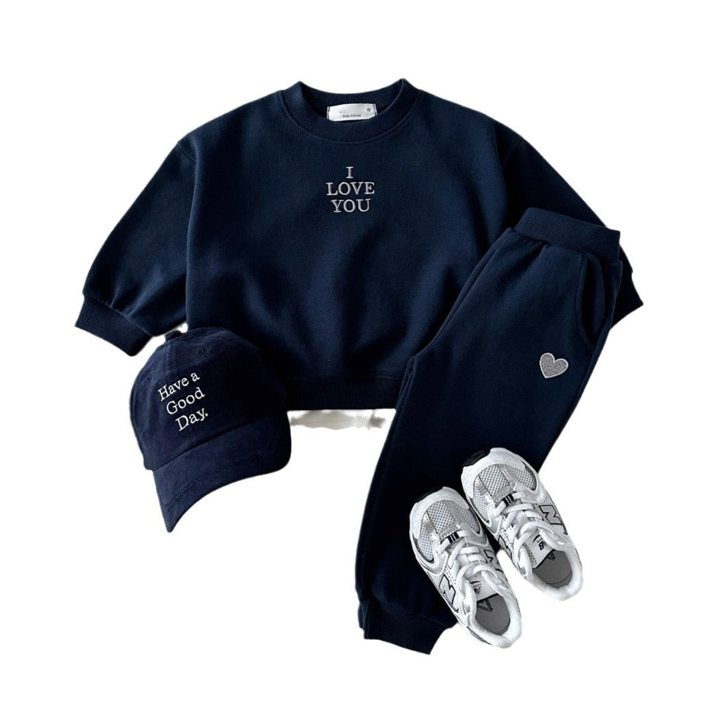 R&G Boutique embroidered letter love kids' comfortable sweater and two-piece suit, featuring colorful embroidery and cozy fabric.