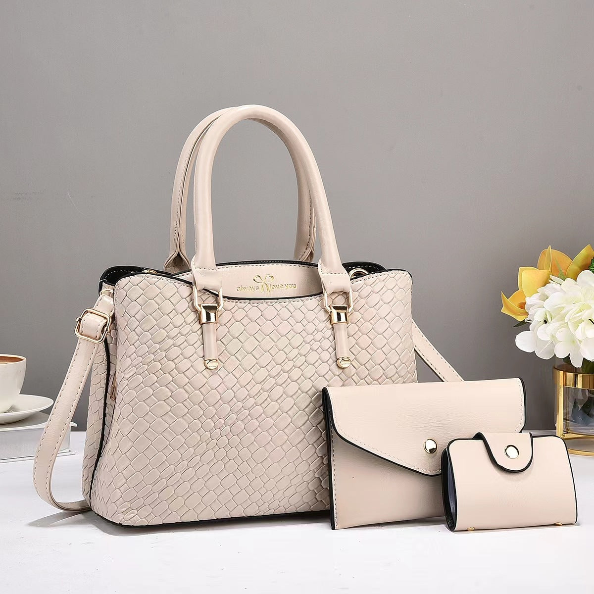 R&G Boutique woven texture three-piece set with large capacity one-shoulder bags and matching smaller pouches displayed on a neutral background.