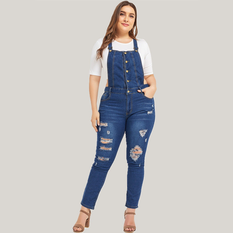 Ripped denim overalls from R&G Boutique featuring distressed details, adjustable straps, and a casual fit.