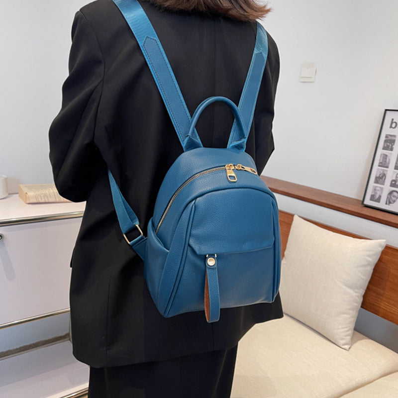 Cute black PU backpack for women by R&G Boutique, small fashion schoolbag with soft texture and stylish design.