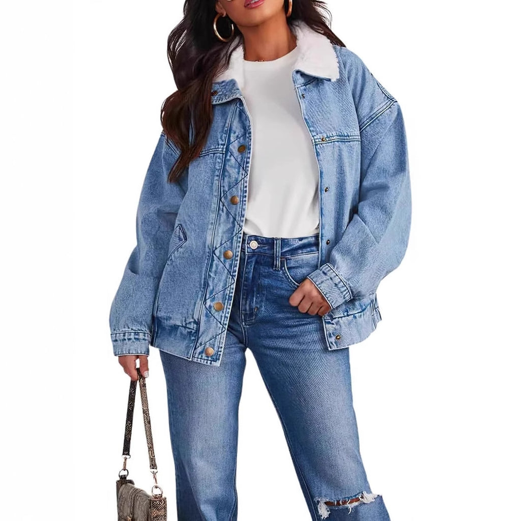 Women's denim jacket with fur collar from R&G Boutique, featuring classic blue denim and stylish warm lining.