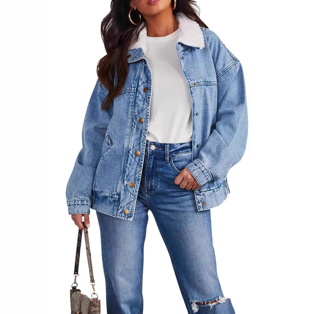 Women's denim jacket with fur collar from R&G Boutique, featuring classic blue denim and stylish warm lining.