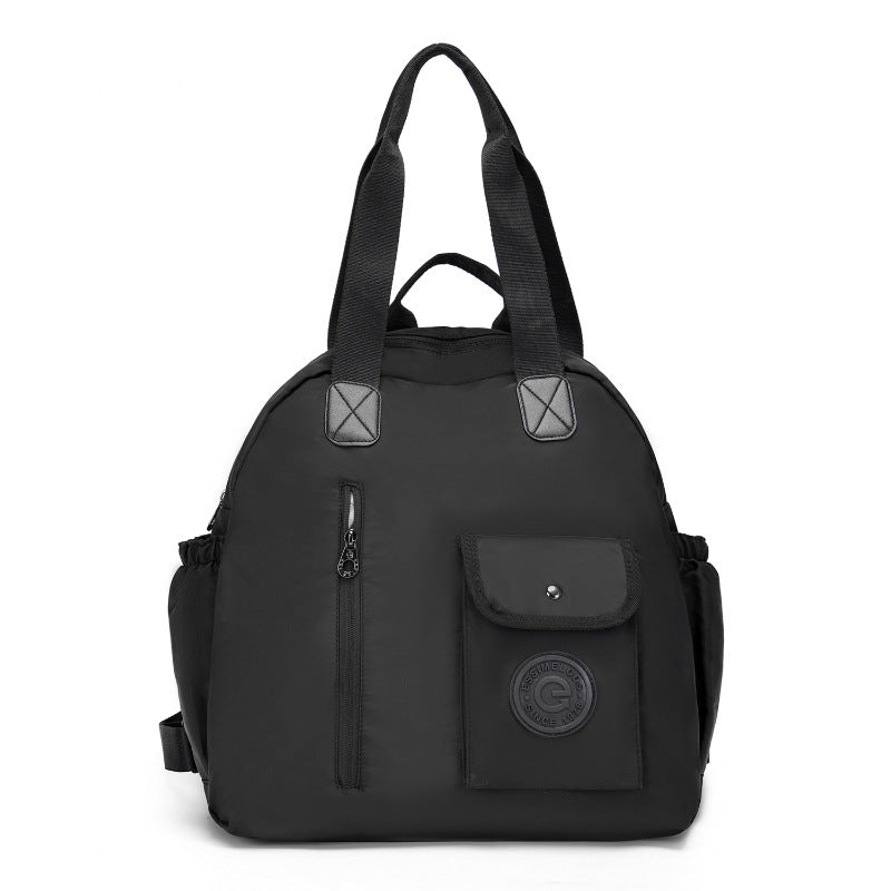 Outdoor lightweight large capacity multifunctional backpack for women with multiple compartments and adjustable straps by R&G Boutique.