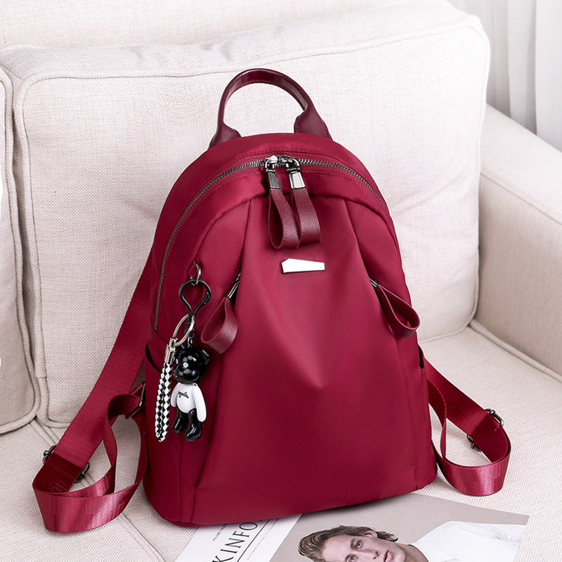R&G Boutique women's solid color backpack with multiple compartments, suitable for school, outdoor travel, and casual use.