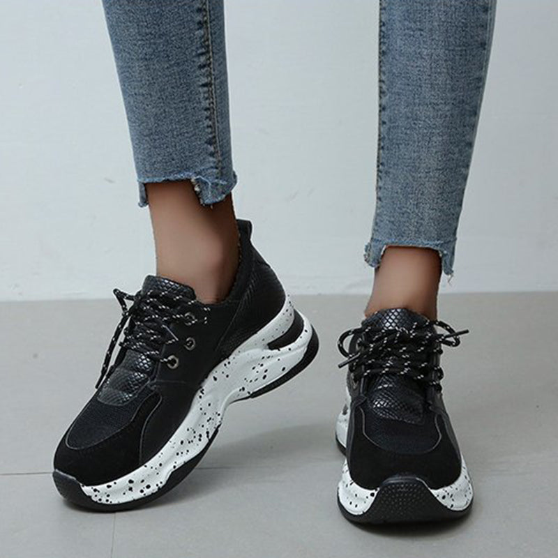 Leopard print women's sneakers by R&G Boutique featuring lace-up design, suitable for walking, running, and sports activities.