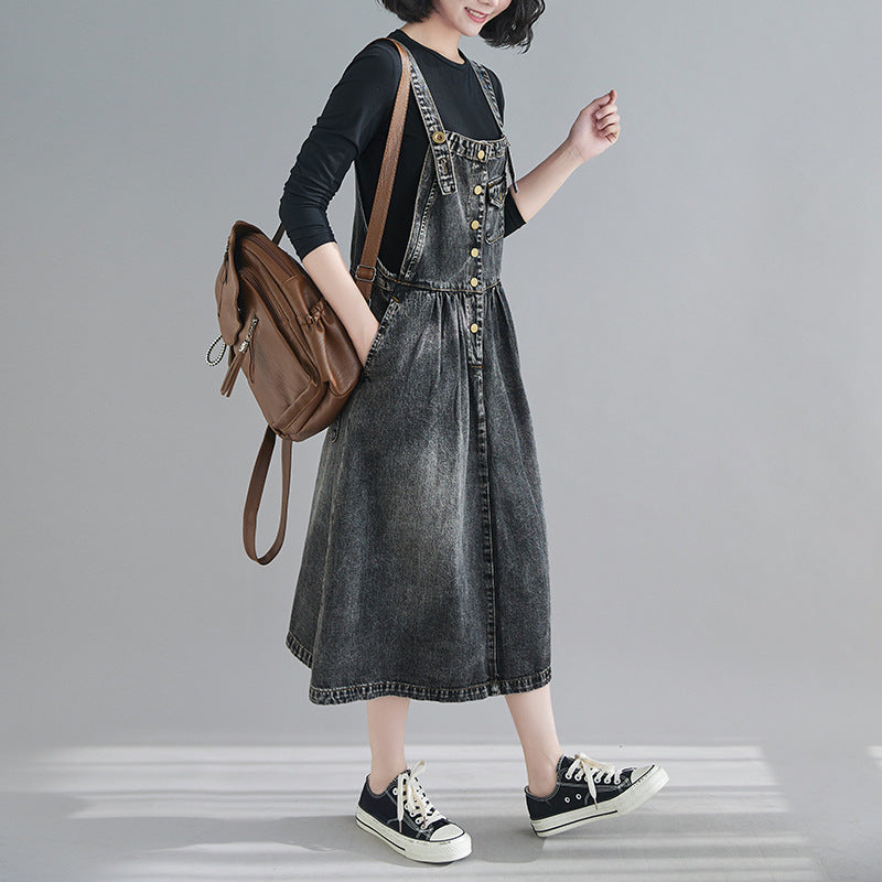R&G Boutique denim suspender skirt dress with adjustable straps, classic denim fabric, and a stylish A-line silhouette.