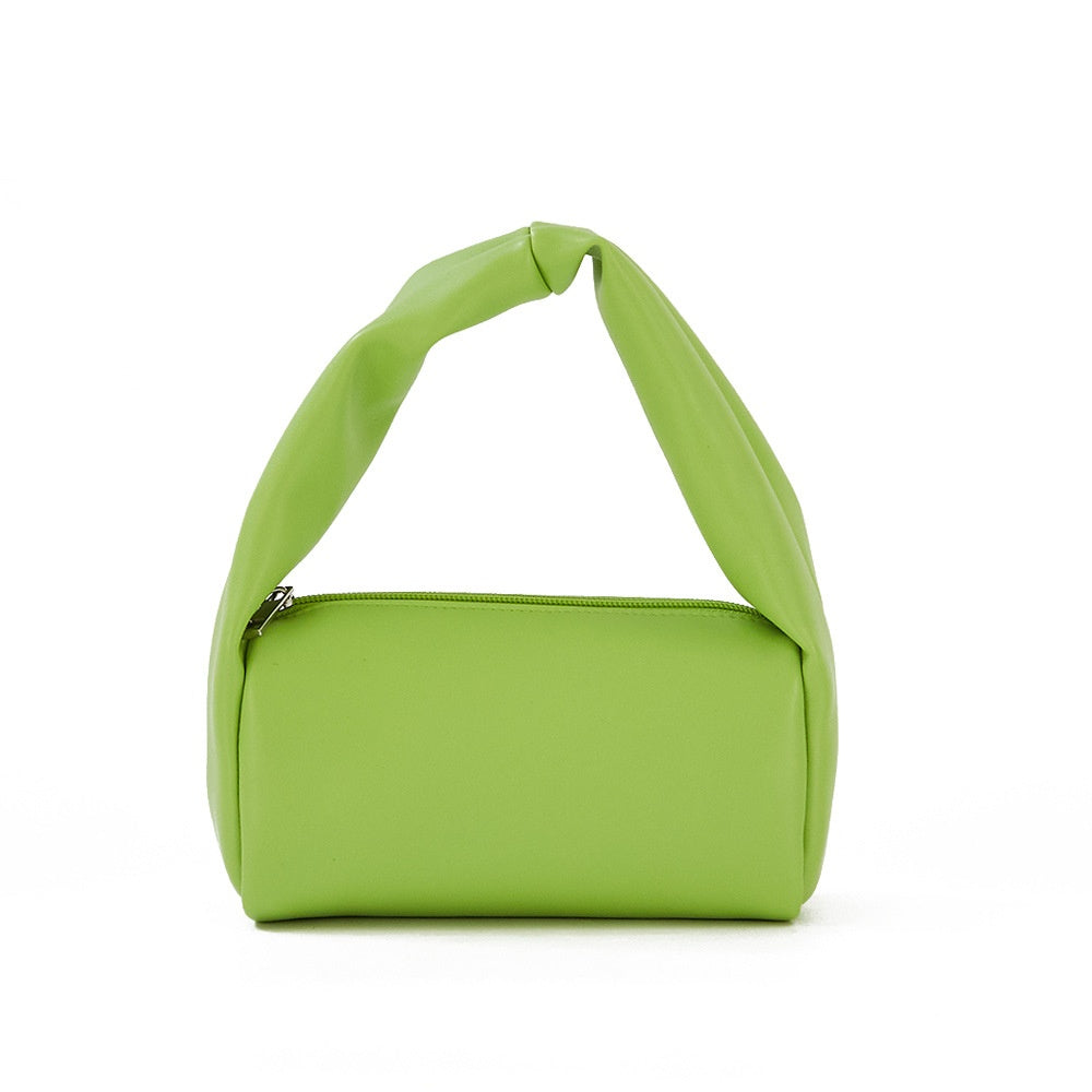 Mini candy color women's cosmetic bag by R&G Boutique with portable toiletry storage and stylish design.