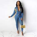 R&G Boutique fringed denim jumpsuit with wide legs and distressed detailing, displayed on a hanger against a neutral background.