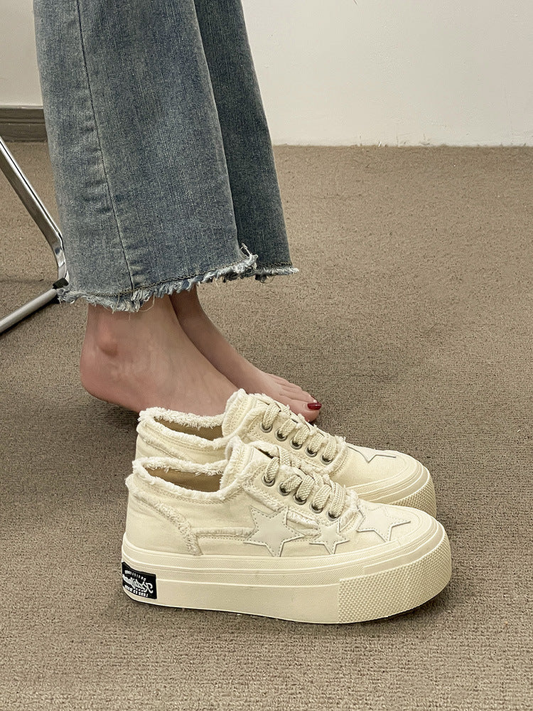 Women's thick-soled denim canvas shoes by R&G Boutique with stylish, casual design and sturdy rubber soles.