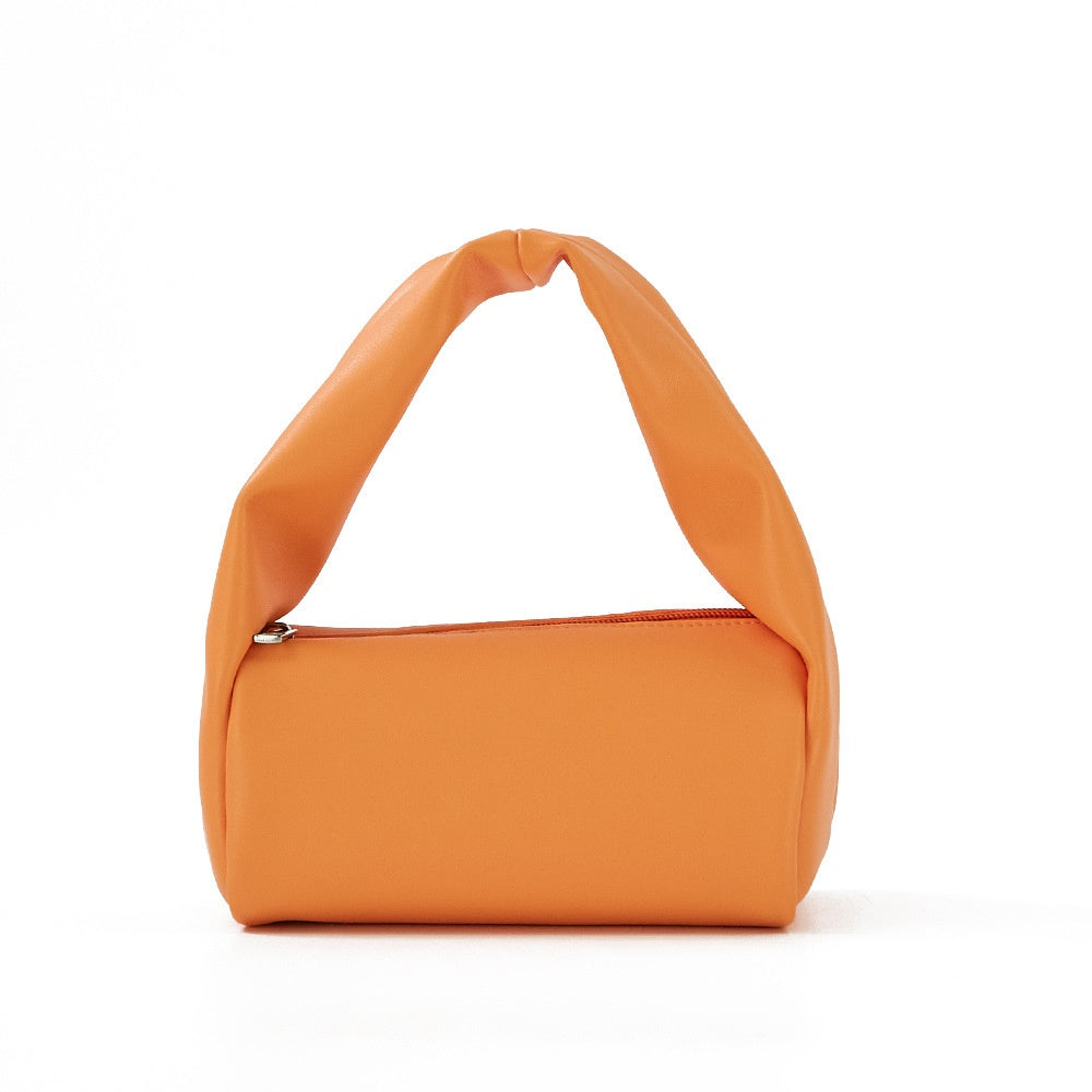 Mini candy color women's cosmetic bag from R&G Boutique, portable toiletry storage with vibrant, stylish design.