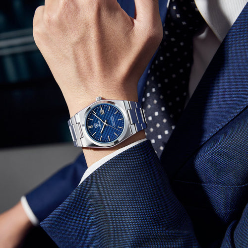Men's Swiss quartz watch with butterfly clasp, R&G Boutique branded timepiece featuring a sleek metal strap and classic dial design.