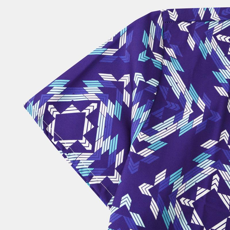 Men's short sleeve beach shirt with ethnic print from R&G Boutique, featuring vibrant patterns and lightweight fabric.