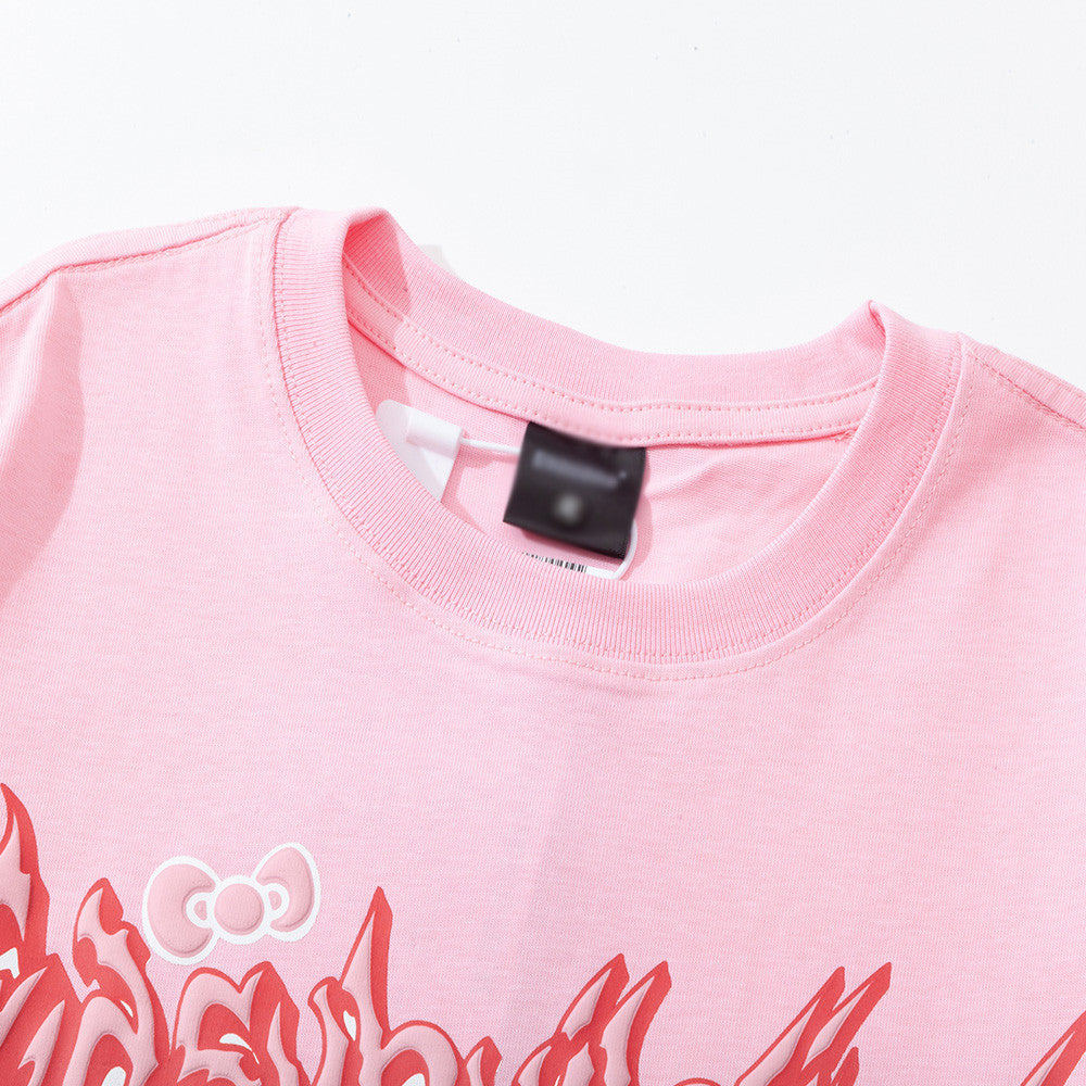 Letter print short-sleeve heavy cotton t-shirt by R&G Boutique, shown in a close-up of the front with bold letter designs.