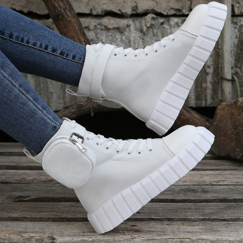 Fashionable women's high-top canvas shoes by R&G Boutique featuring breathable material and stylish design.