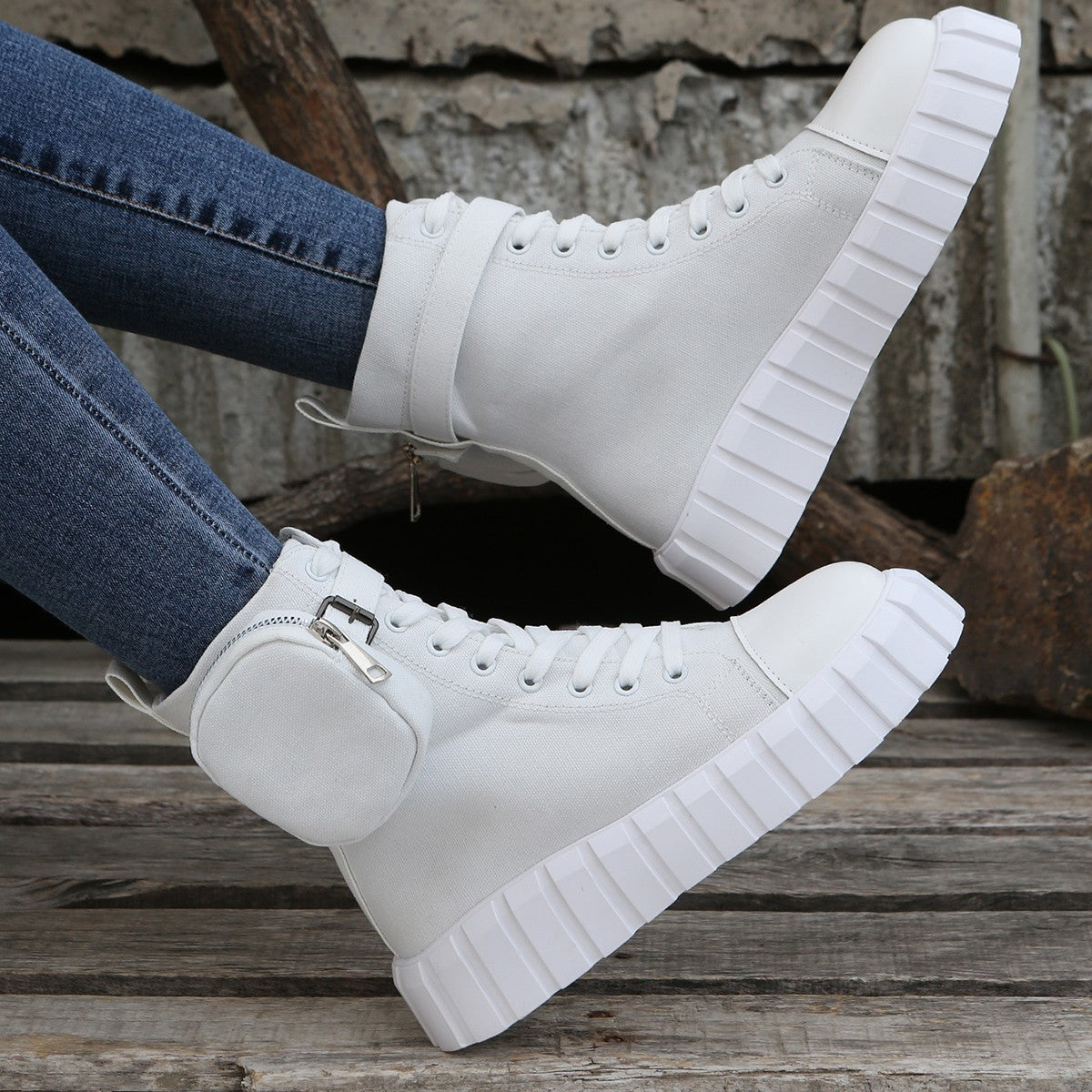 Fashionable women's high-top canvas shoes by R&G Boutique featuring breathable material and stylish design.