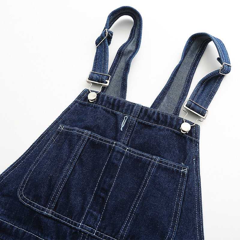 Men's loose denim jumpsuit with bib top pants from R&G Boutique, featuring a casual, relaxed fit in classic denim fabric.
