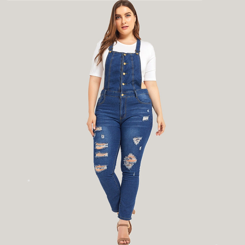 Ripped denim overalls from R&G Boutique, featuring distressed details and adjustable shoulder straps on a casual fit.