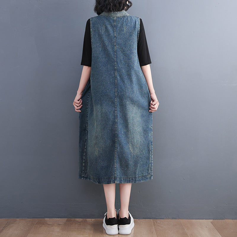 Vintage denim waistcoat camisole dress with diagonal placket and lace-up detail, styled for women, by R&G Boutique.