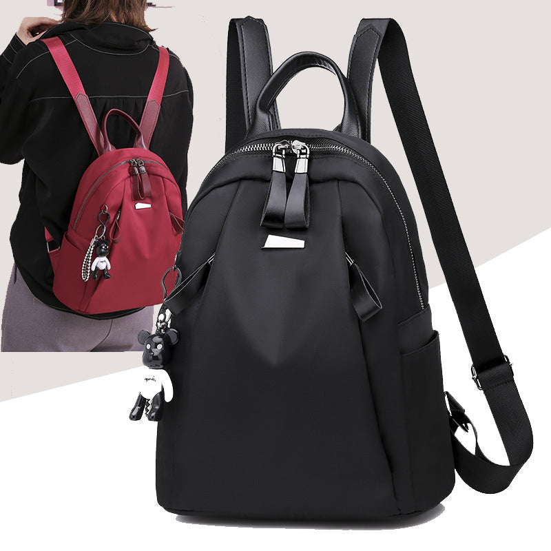 R&G Boutique women's solid black Ins Fashion backpack with multiple compartments, suitable for school and outdoor travel.