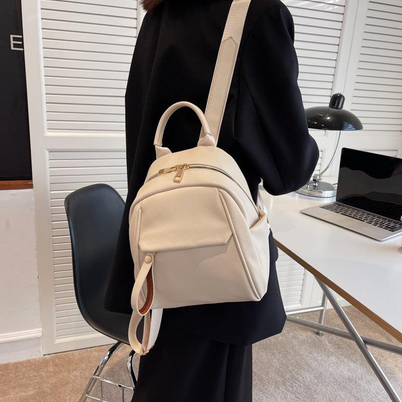 Cute black fashion PU backpack by R&G Boutique, small soft schoolbag for women and students, ideal for casual and school use.