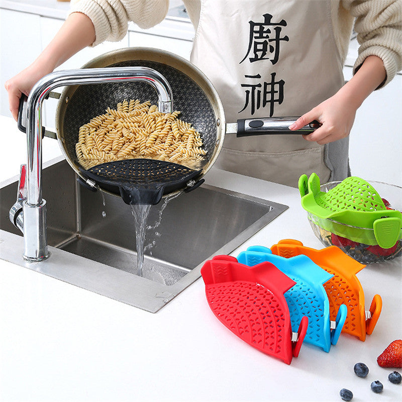 Silicone pot side drain stopper from R&G Boutique, a kitchen gadget for preventing spills and controlling drainage.