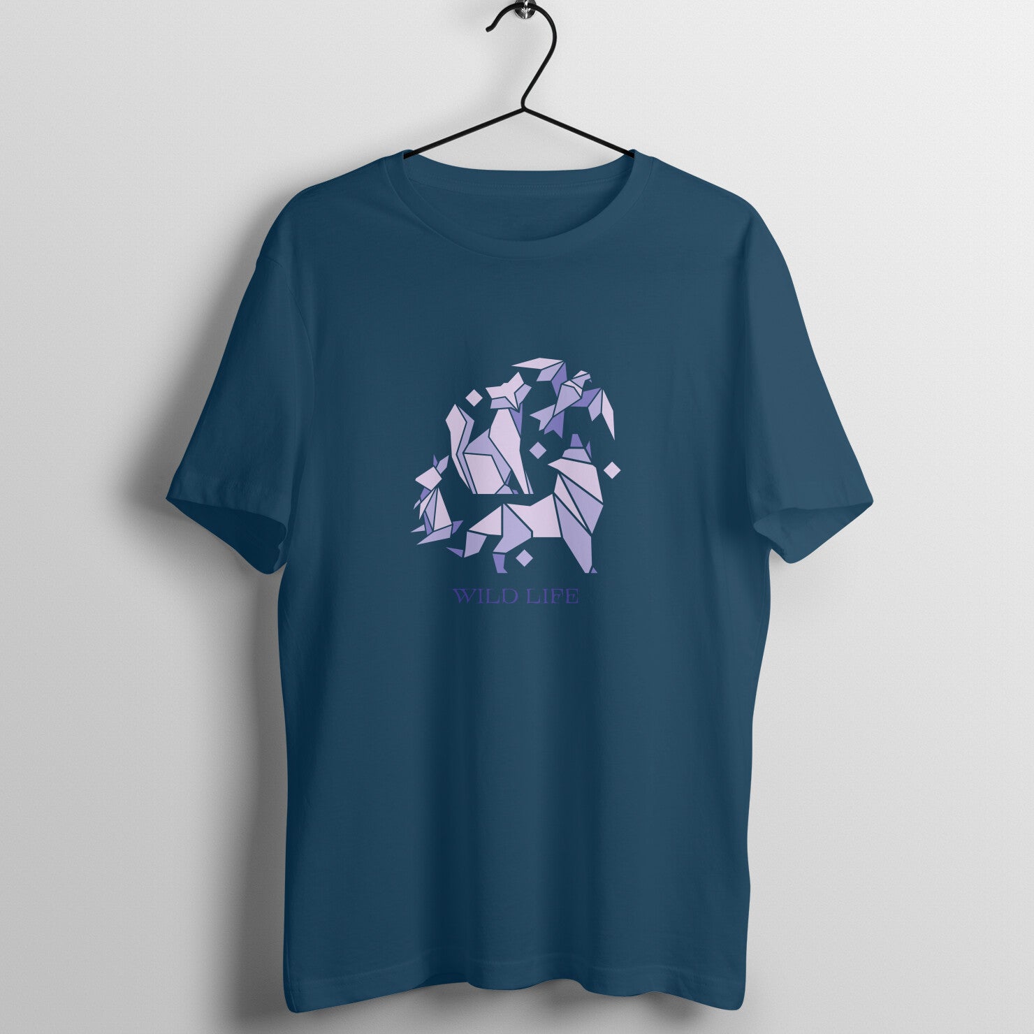 Animal print short-sleeved shirt from R&G Boutique featuring bold animal pattern and casual style.