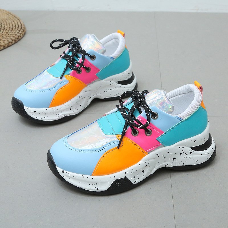 Leopard print women's sneakers by R&G Boutique featuring lace-up design, suitable for walking, running, and sports activities.