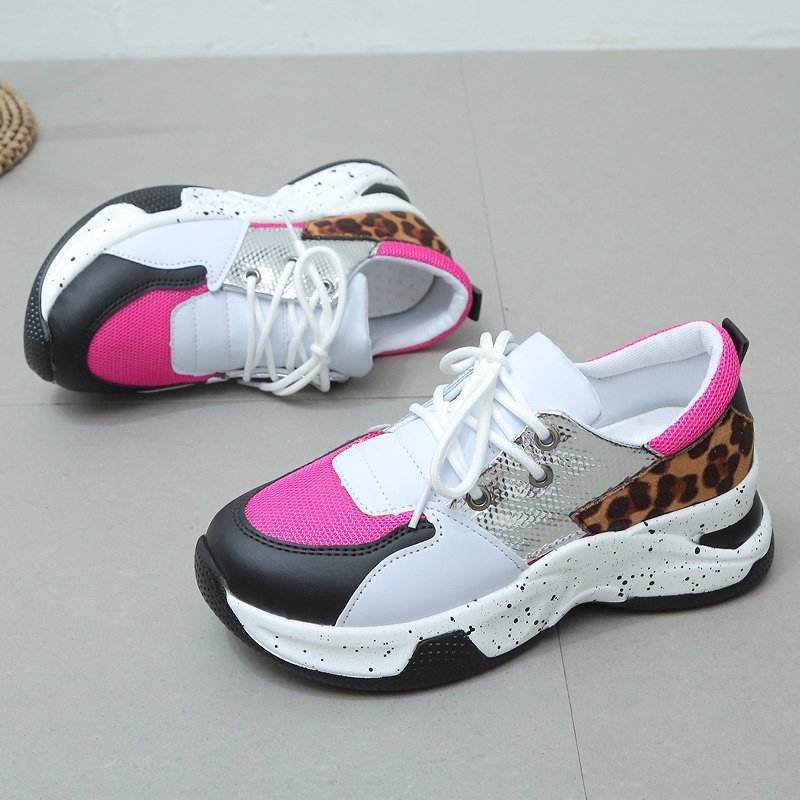Leopard print women's sneakers by R&G Boutique with lace-up design, suitable for walking, running, and sports activities.