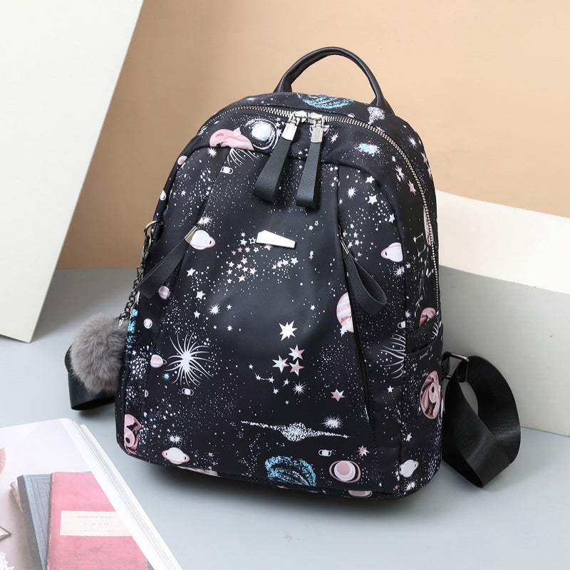 Solid black R&G Boutique women's backpack with multiple compartments, suitable for school, outdoor travel, and daily use.