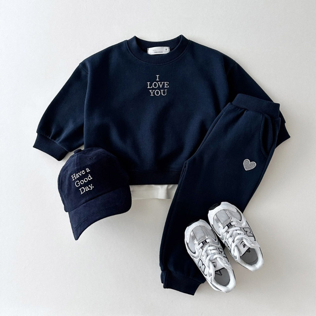 Kids' embroidered letter love sweater and matching pants set by R&G Boutique, featuring colorful embroidery on a cozy two-piece suit.