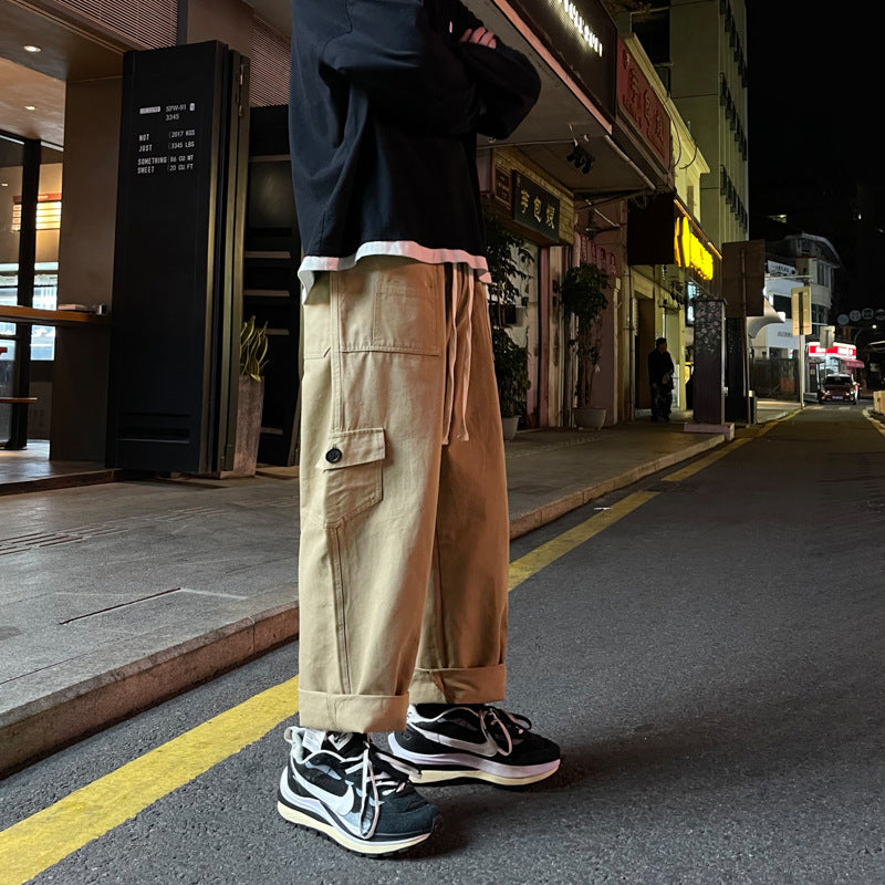Light beige Japanese casual loose trousers from R&G Boutique featuring a relaxed fit and solid color design.
